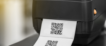 What is the difference between thermal transfer and direct thermal printing?
